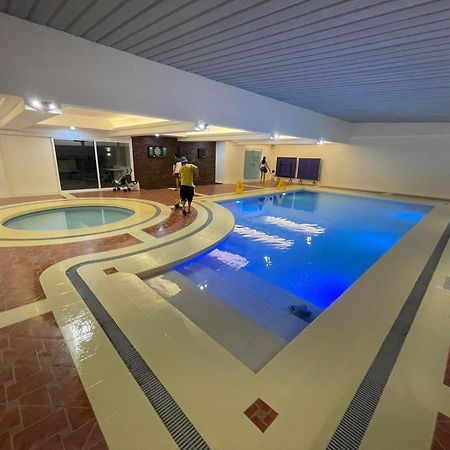 Burgundy Mckinley Place Service Apartment Manila Exterior photo